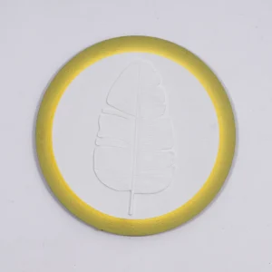 Banana leaf LED wall decor with embossed white plaster leaf relief and bright yellow-gold backlit rim